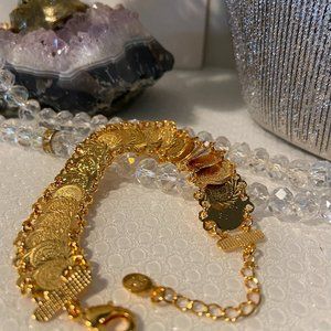 Elegant Gold tone Coin style Bracelet .